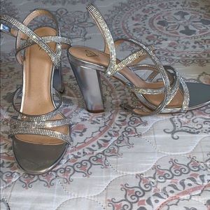Selling these heels , only used once for my wedding.